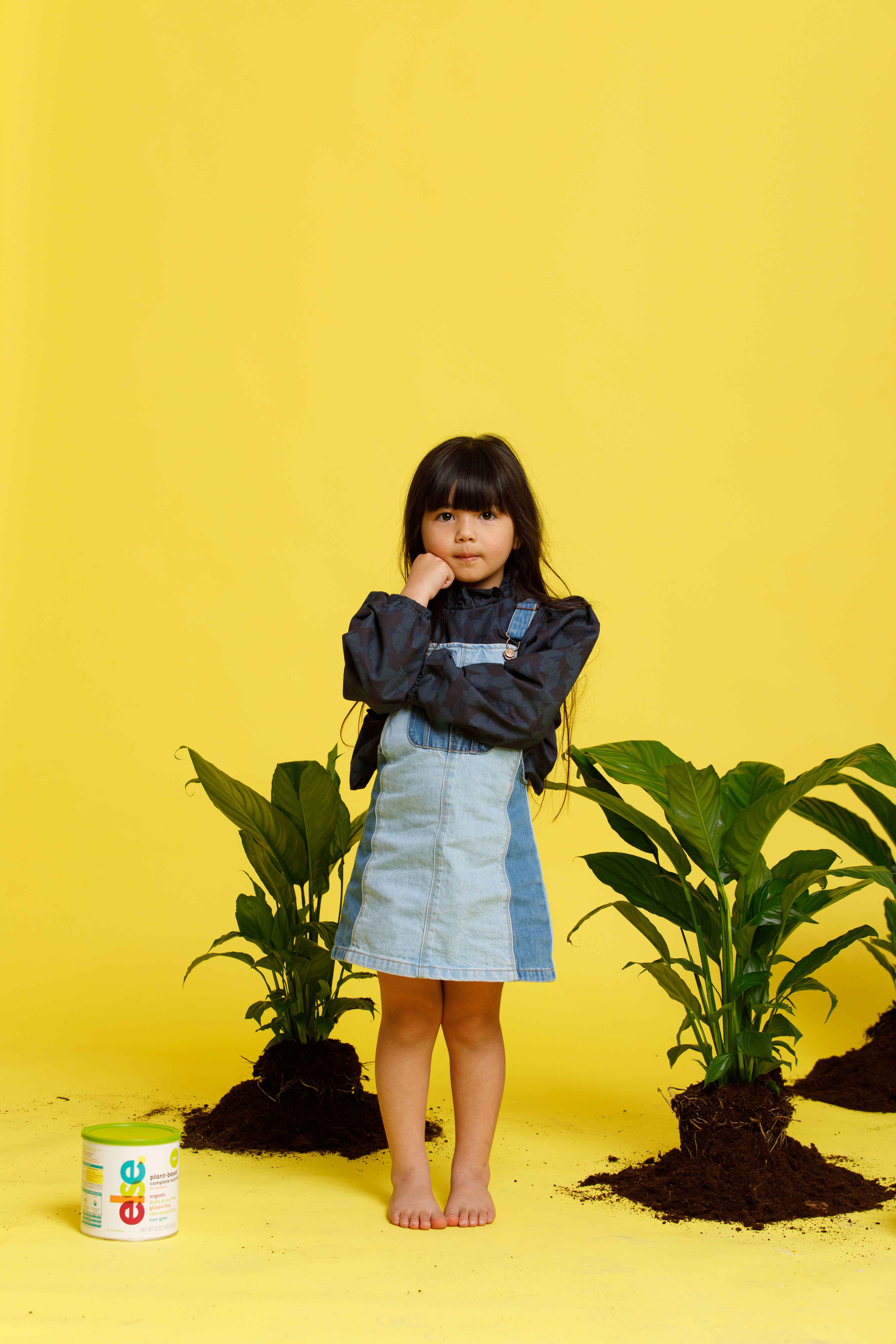 Girl standing beside else nutrition